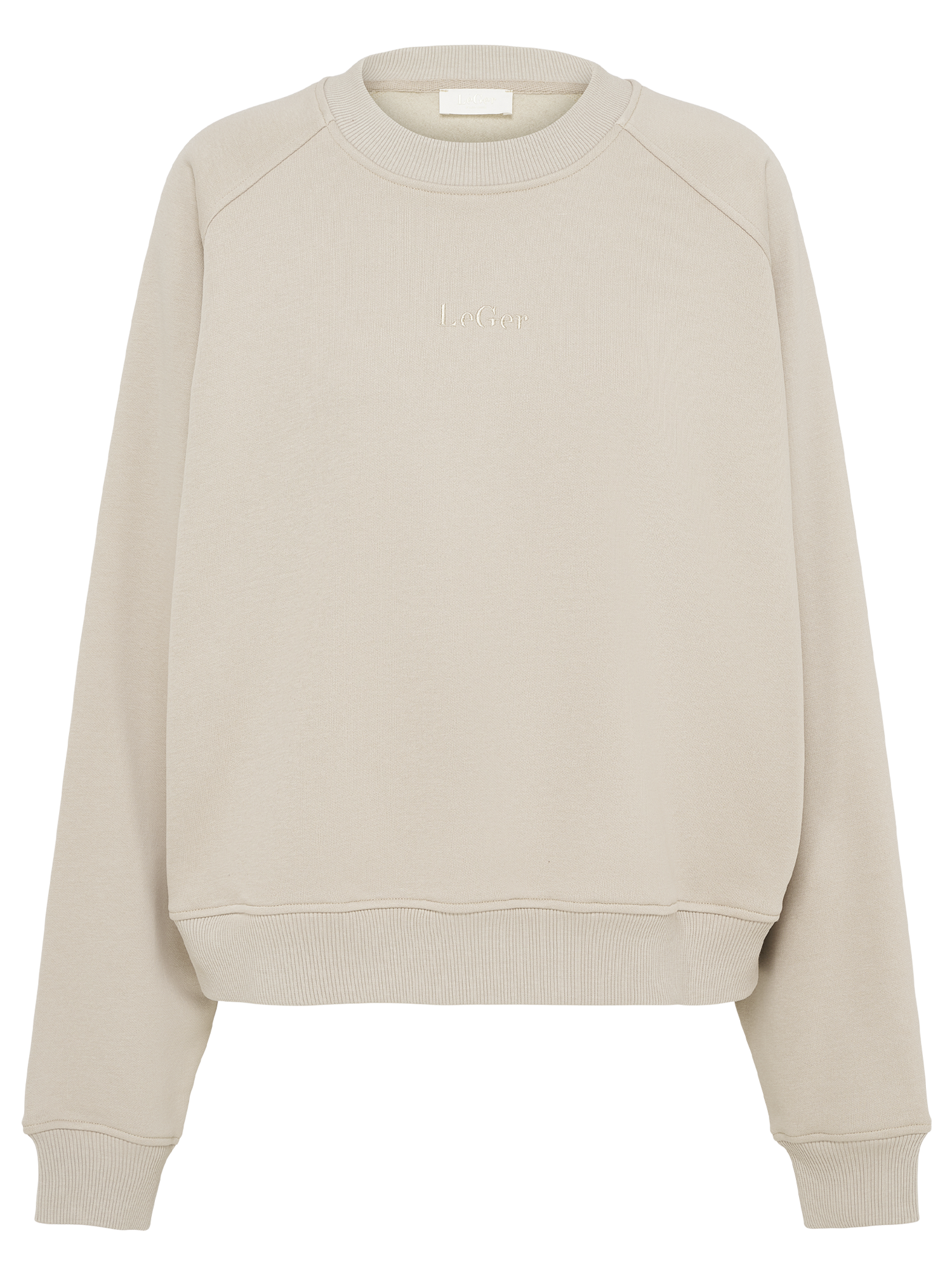 Der Melody Sweater von LeGer by Lena Gercke ist ein schlichter, hellbeiger Crewneck in Größe 36 mit langen Ärmeln und gerippten Bündchen und Saum. Der Schriftzug "LeGer" ist dezent auf der Brust mit passendem Garn aufgestickt und sorgt für einen cleanen, entspannten Look.